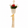 Macramé floral wall hanging with tassel
